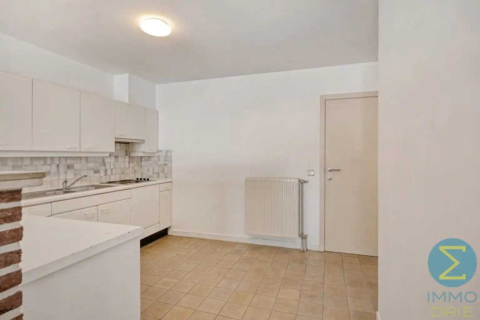 Opbrengsteigendom met 3 verhuurde appartementen en garages foto 7