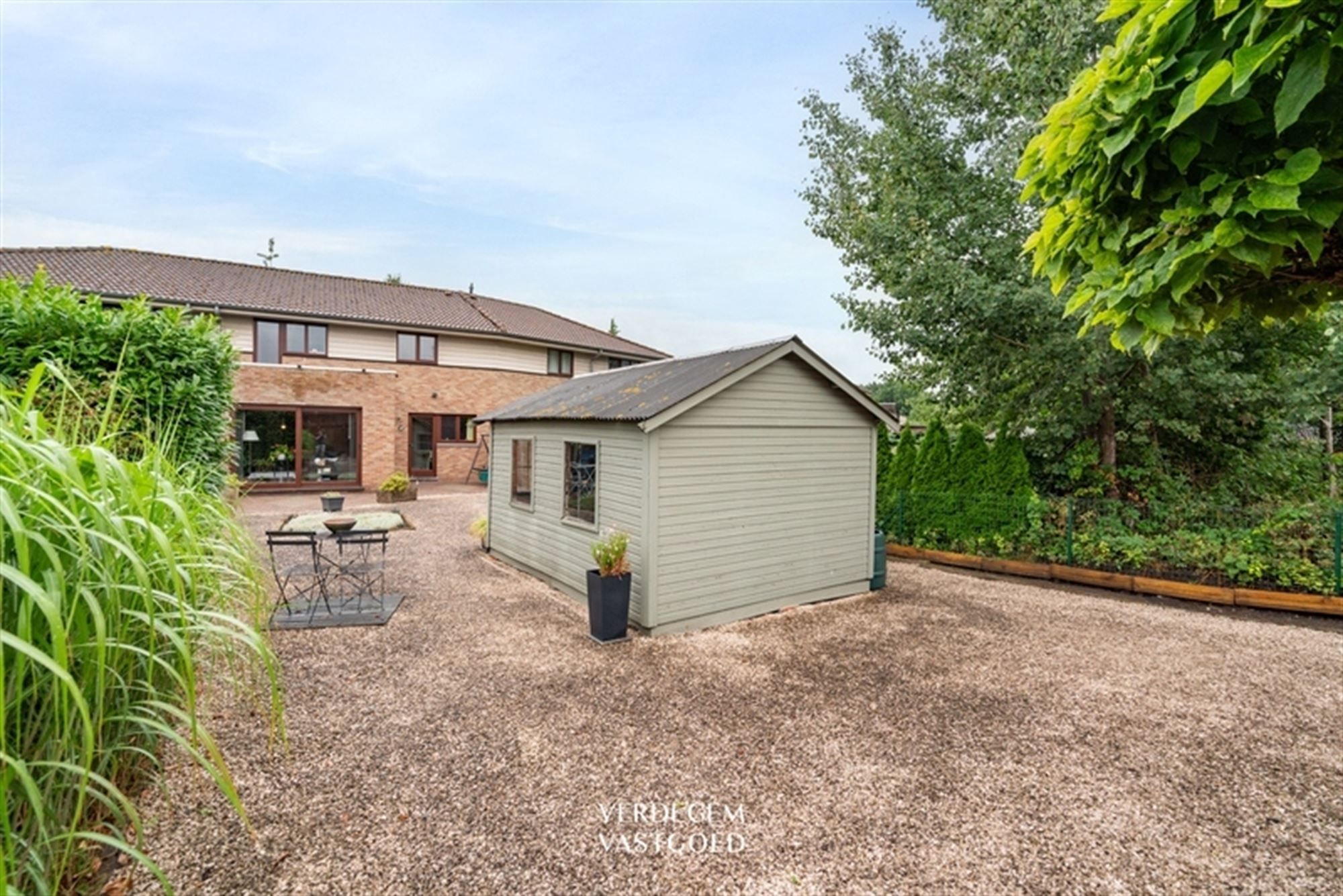 Instapklare woning met 3 slaapkamers, carport en fijne tuin foto 16