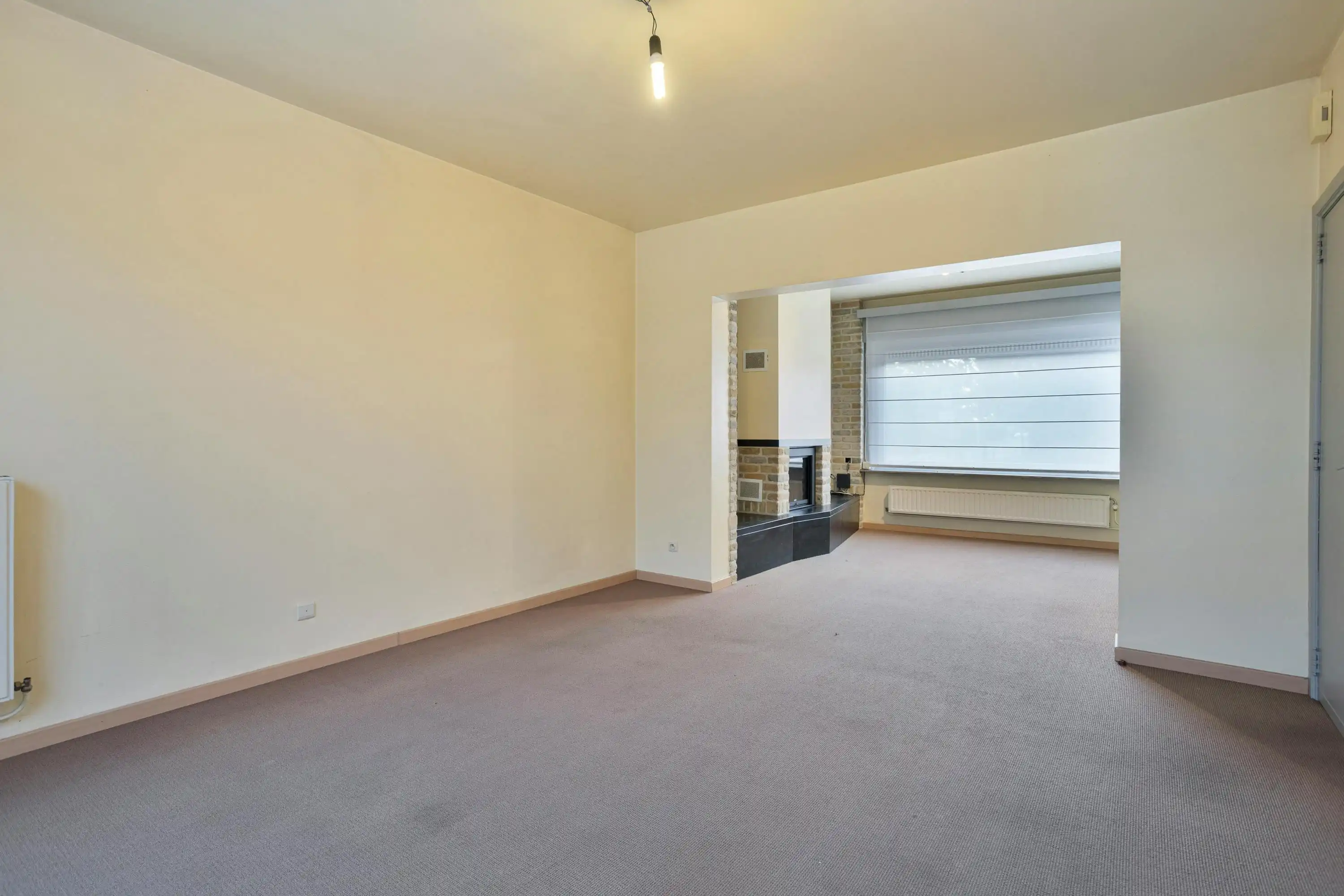 Instapklare halfopen woning met garage en tuin in Roeselare foto 6
