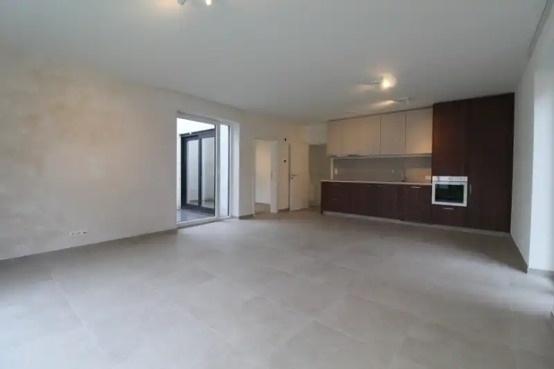 Gelijkvloers nieuwbouw appartement met zonnige tuin te Gent foto 2