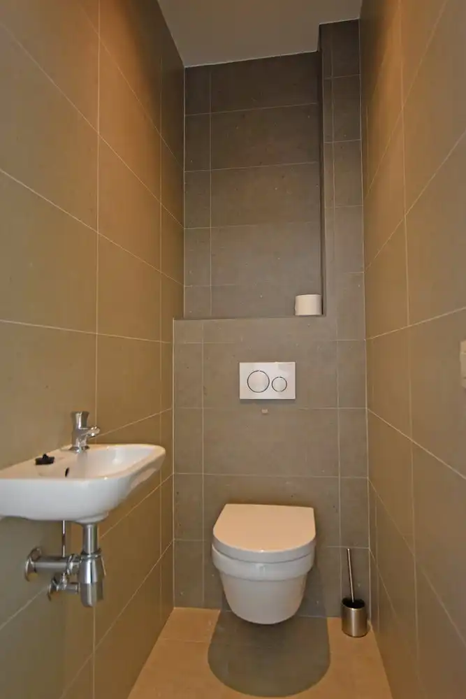 Nieuwbouwappartement met één slaapkamer en een ruim Z-terras te Broechem! foto 10