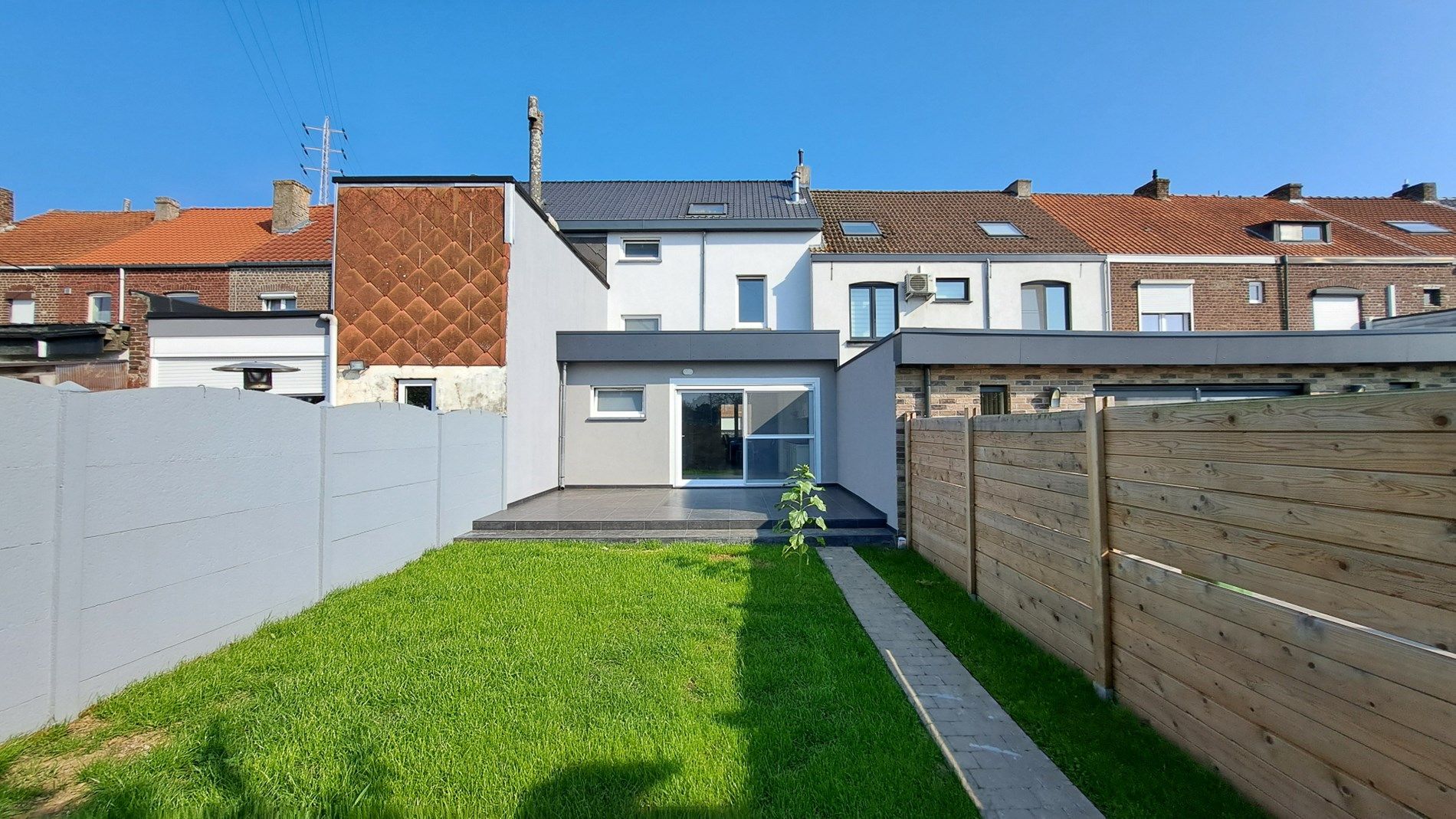 Gerenoveerde gezinswoning met 4 slaapkamers, kelder en tuin foto 2