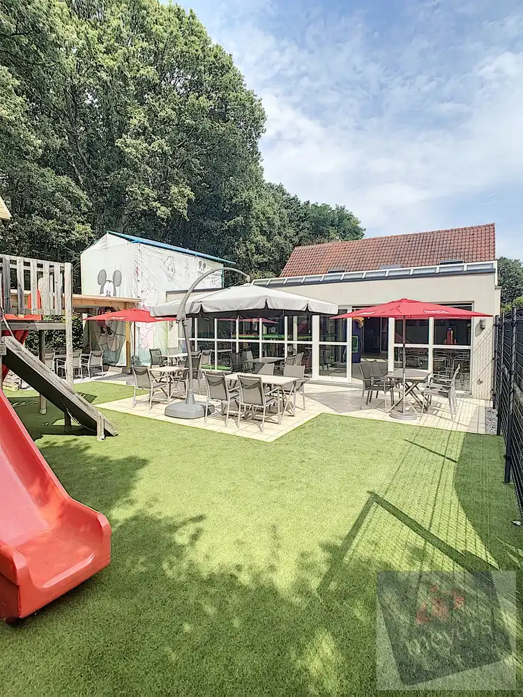 Handelsruimte met woonst op zichtbare ligging in Koersel foto 12