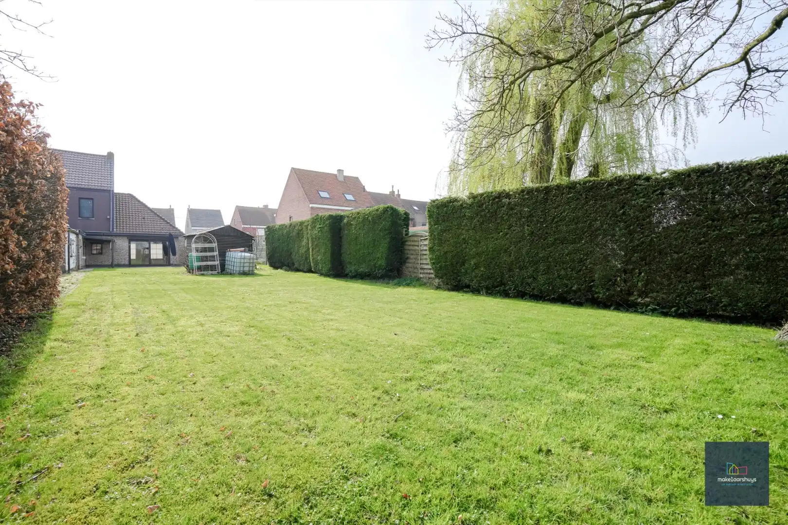 Ruime  halfopen bebouwing  met  zonnige tuin, terras en garage in Waarschoot  foto 28