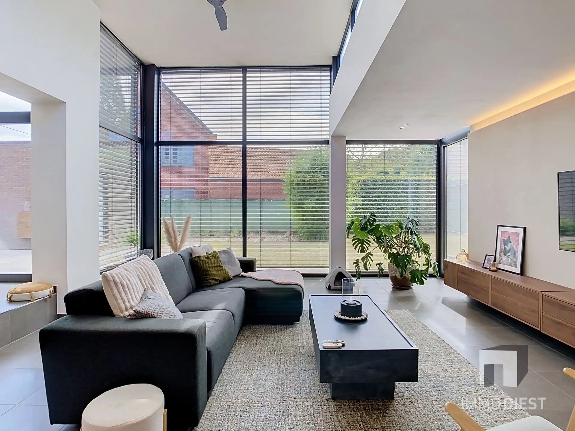 Moderne, lichtrijke woning met aangename tuin aan de voet van hartje Scherpenheuvel. foto 10