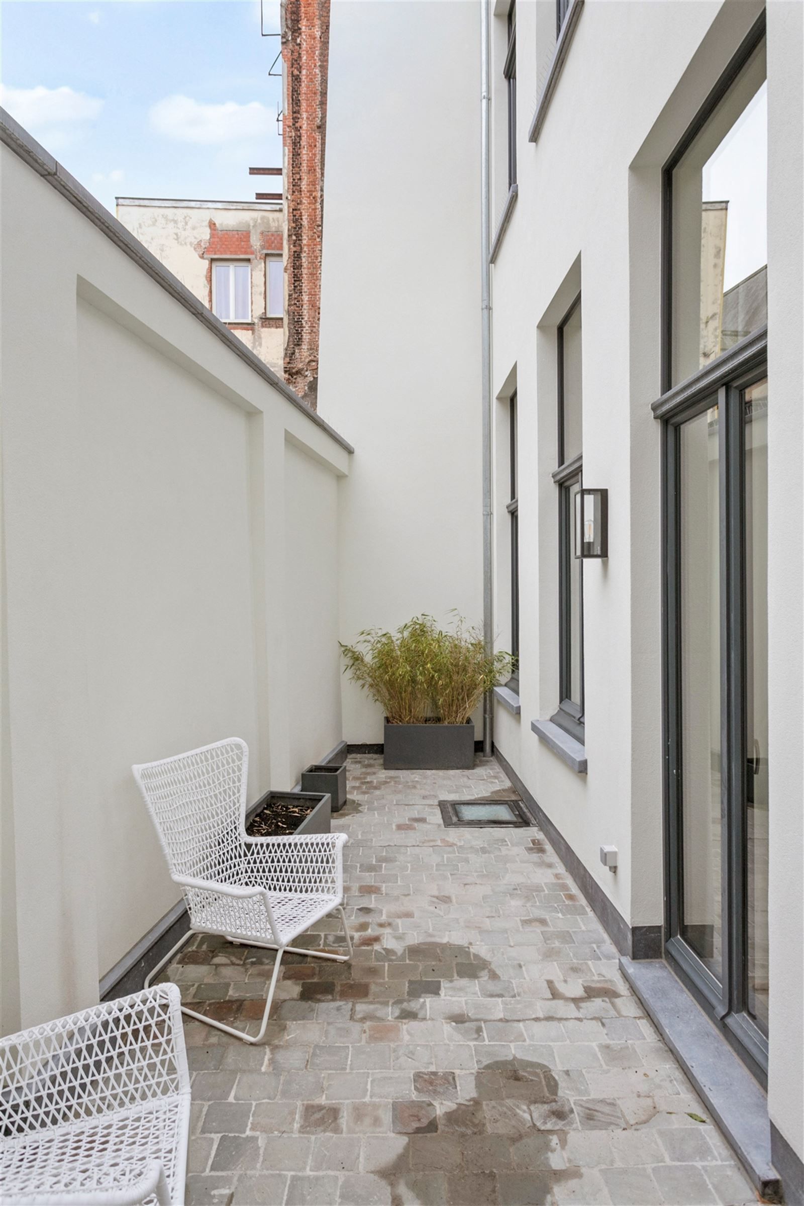 Volledig gemeubeld gelijkvloers 1 slaapkamer appartement met koer in"Stylish renovatieproject" foto 14