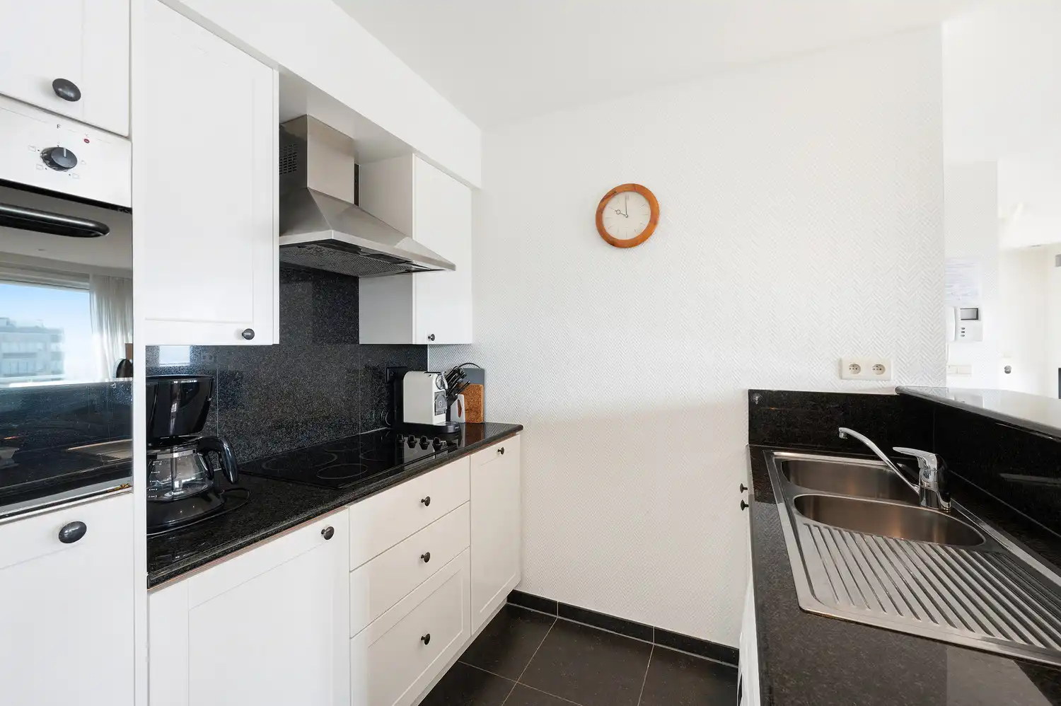 Exclusief duplexappartement met riant zonneterras en panoramisch zeezicht aan het Heldenplein foto 9
