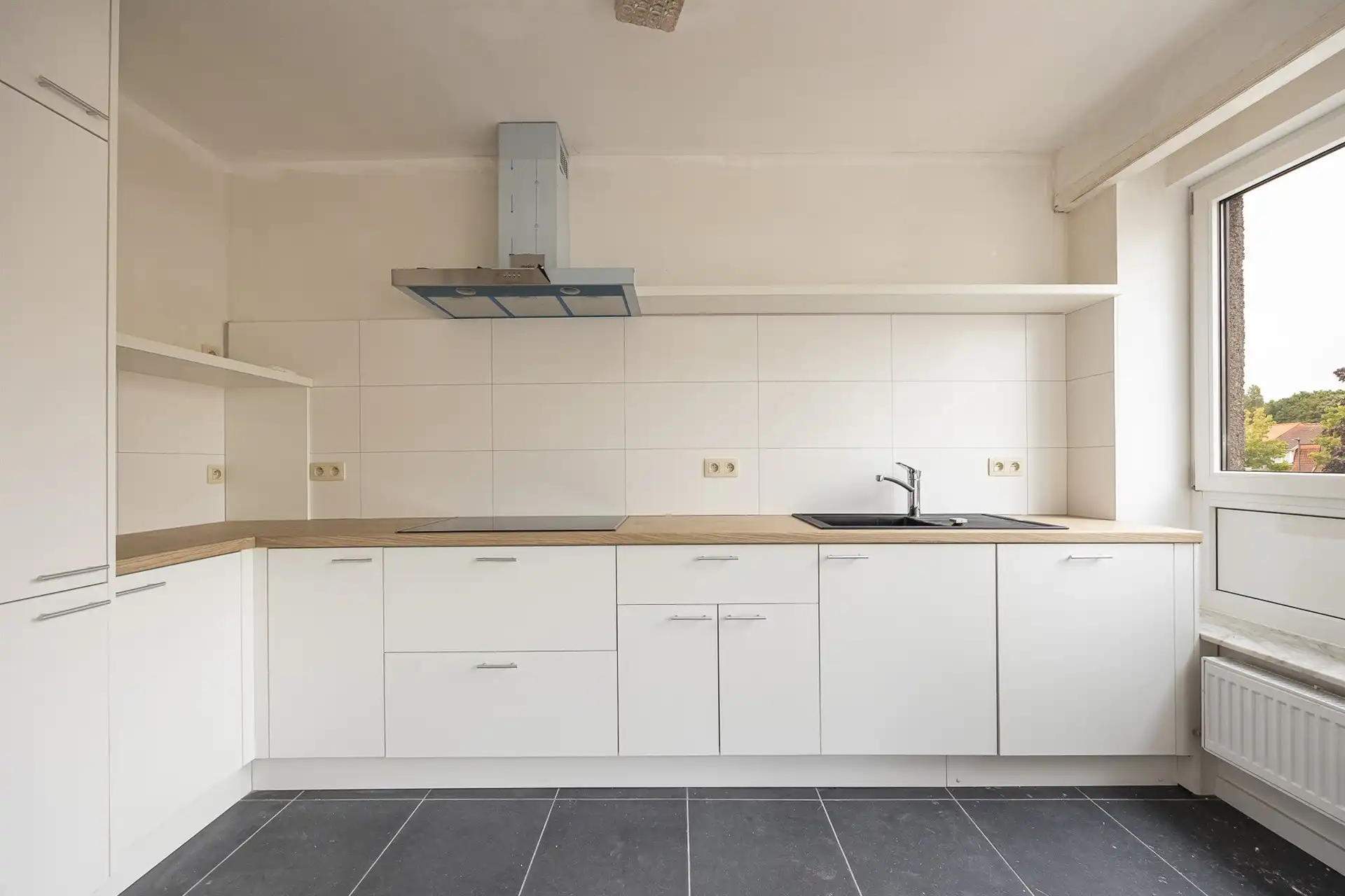 Gelijkvloerse INSTAPKLARE duplex met tuin  in Borgerhout  foto 2