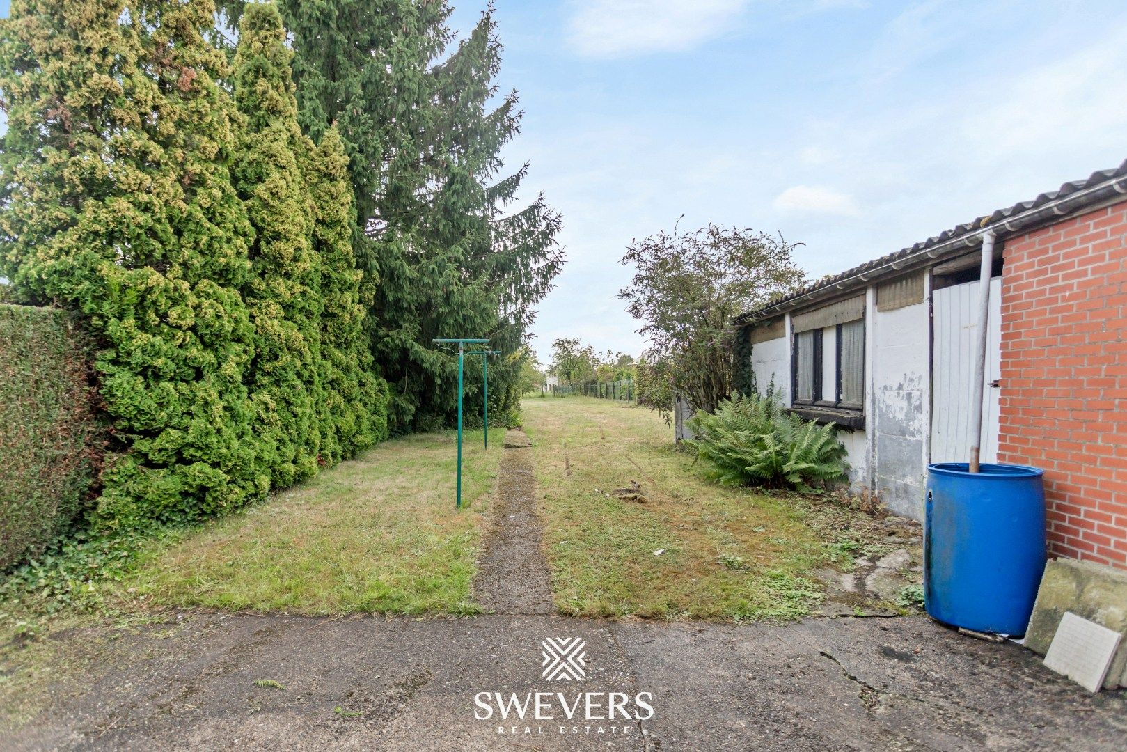 Te renoveren woning met veel potentieel op toplocatie te Diepenbeek foto 30