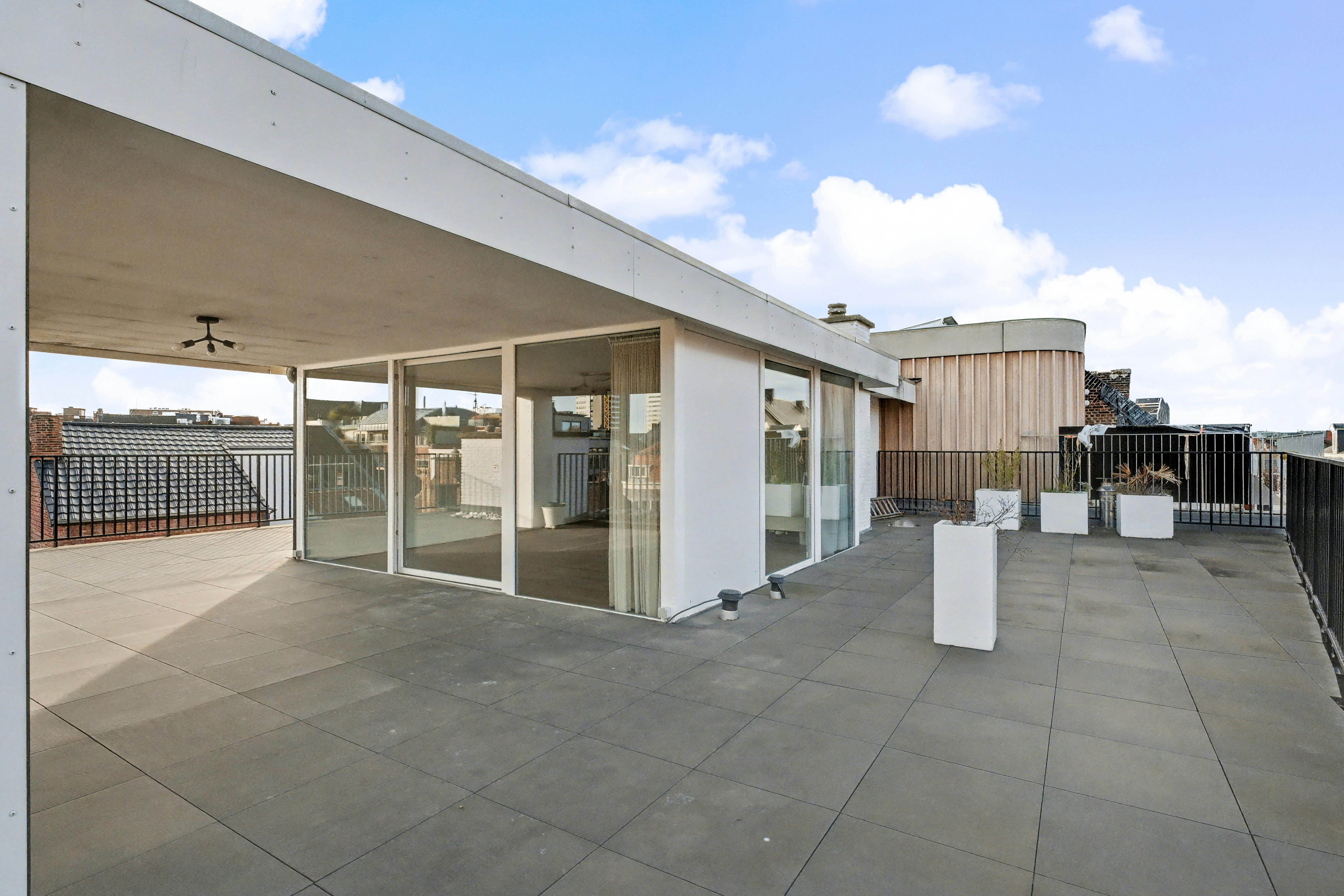 Exclusief duplex-penthouse met adembenemend terras in hartje Hasselt foto 14