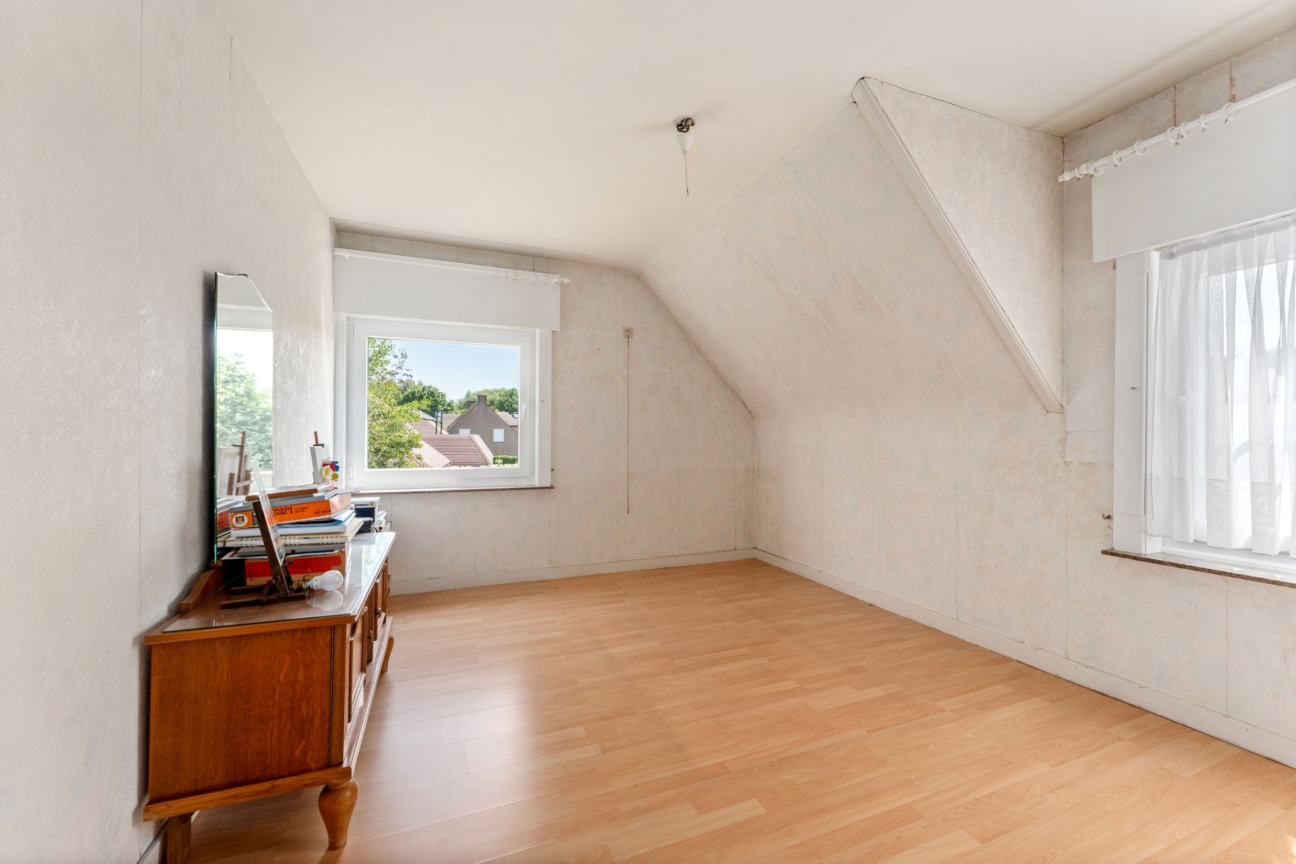 Charmante op te frissen woning met atelier in residentiële buurt foto 17