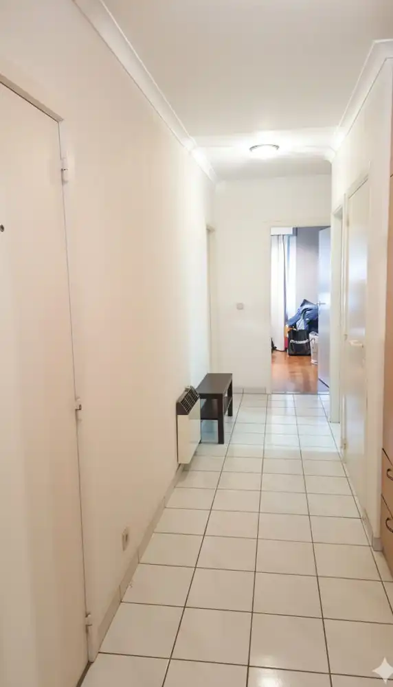 Ruim appartement met twee terrassen en binnenstaanplaats foto 4