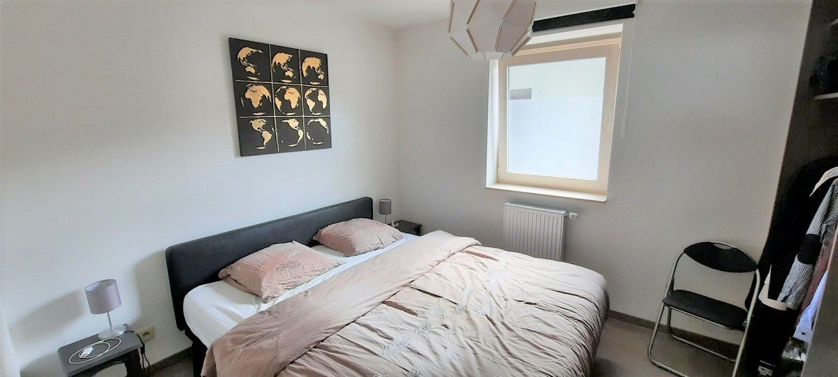 Gelijkvloers app met 1 slk, terras en tuintje, autostaanplaats én garage foto 9