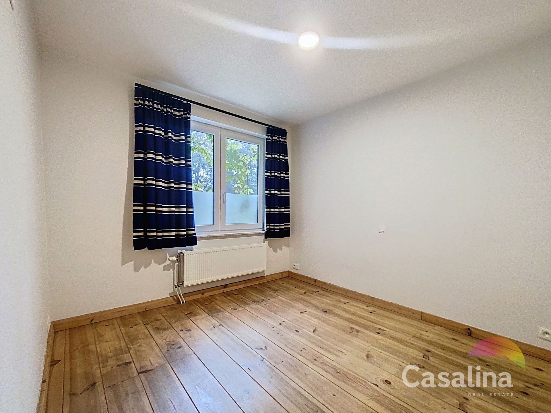 Mooi duplexappartement met grote tuin foto 16
