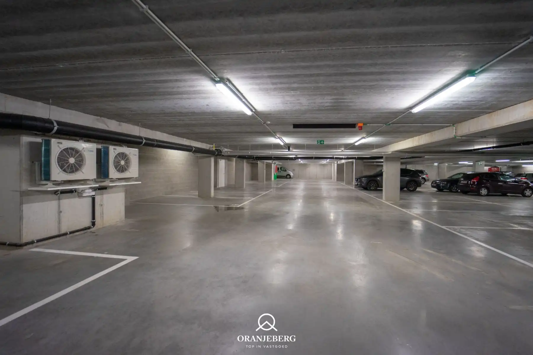 Nieuwbouw autostaanplaats te huur in afgesloten parkeergarage nabij Gent centrum foto 5