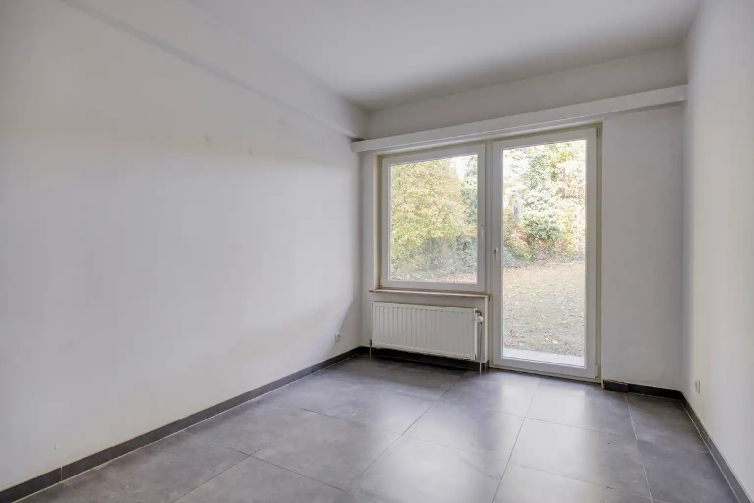 Instapklaar gelijkvloers appartement met eigen tuin foto 12