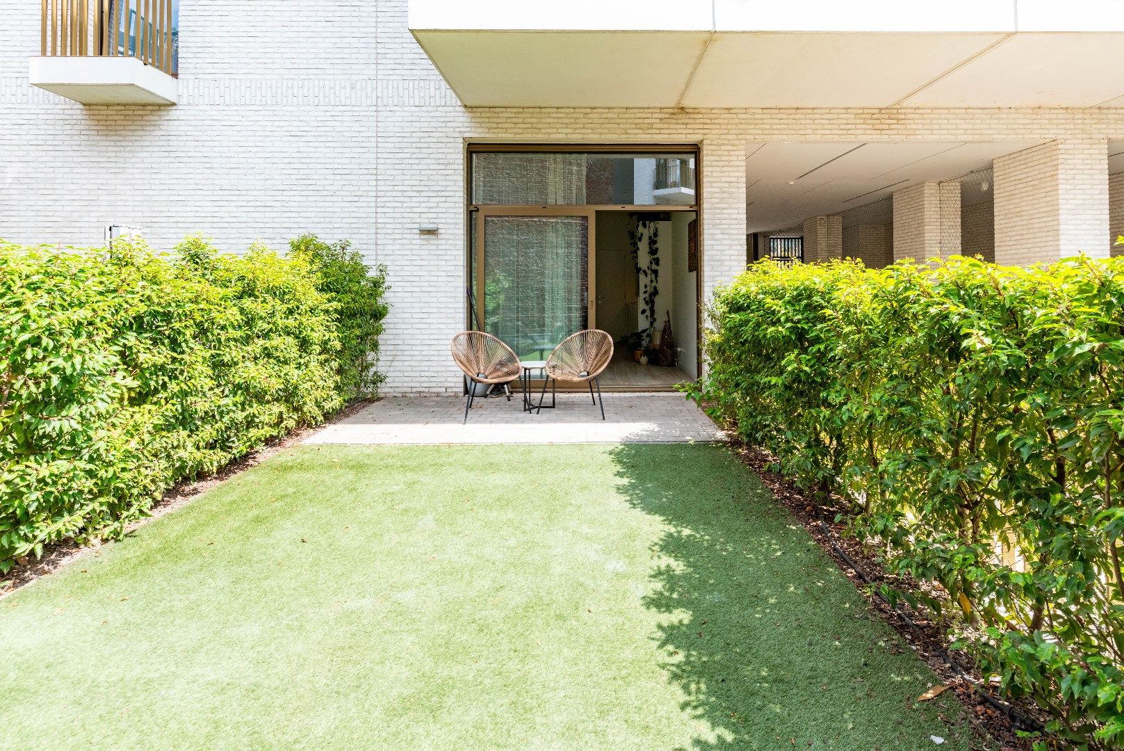 Gelijkvloers appartement met gezellige tuin foto 10