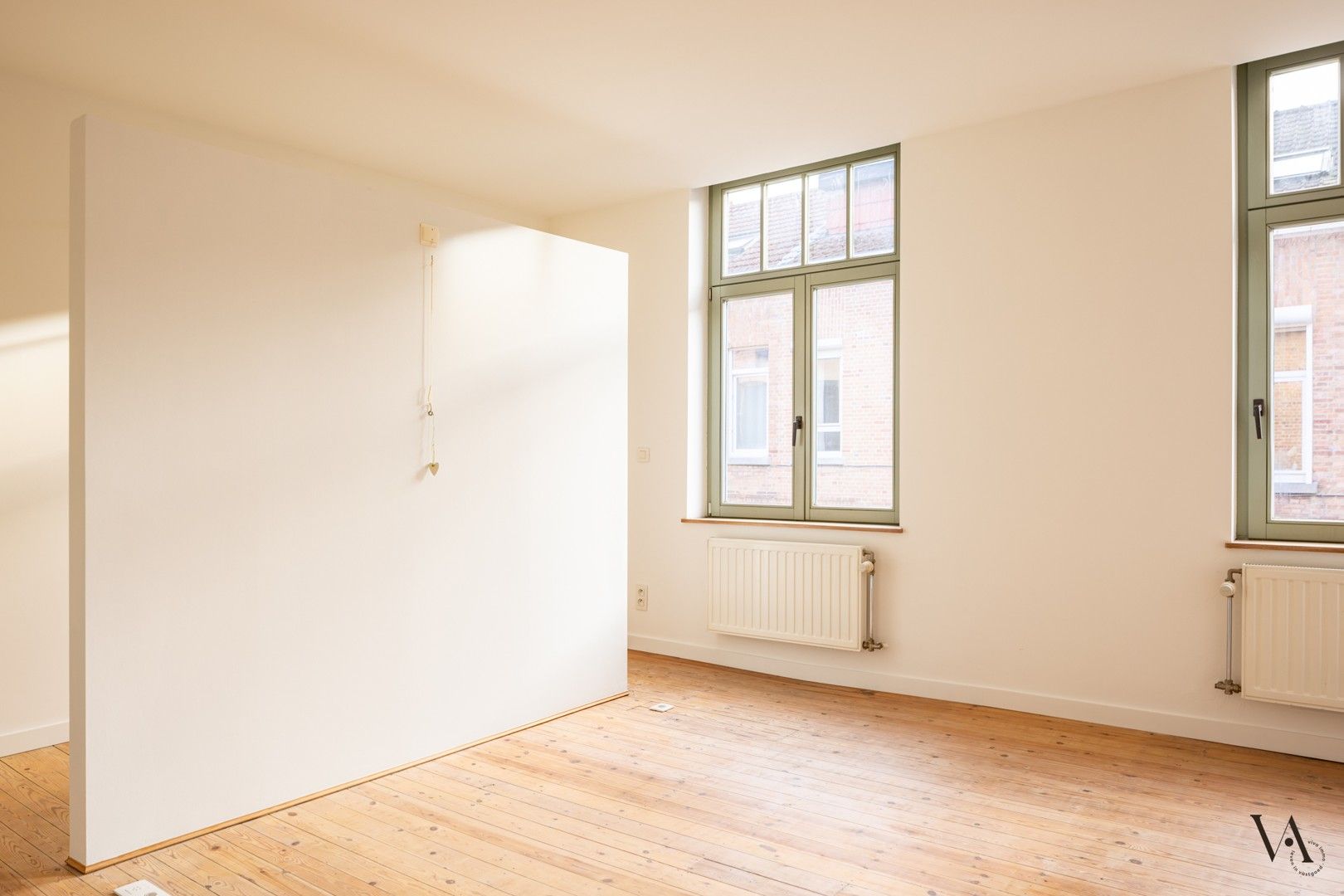 Gerenoveerde gezinswoning met tuin aan Park Michotte foto 7