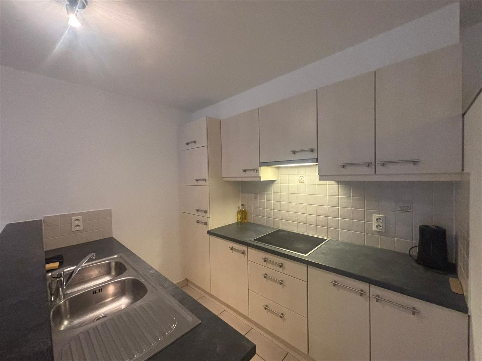 Duplex-appartement met extra zolderkamer + garagebox in het centrum! foto 6