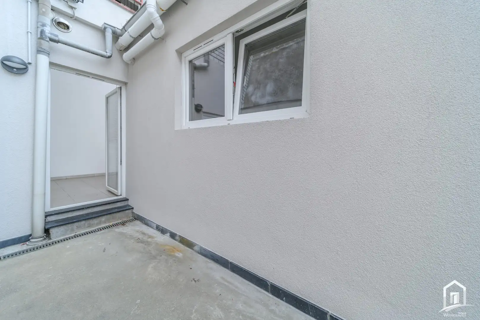 Ruim en energiezuinig gelijkvloersappartement met terras en autostaanplaats foto 18