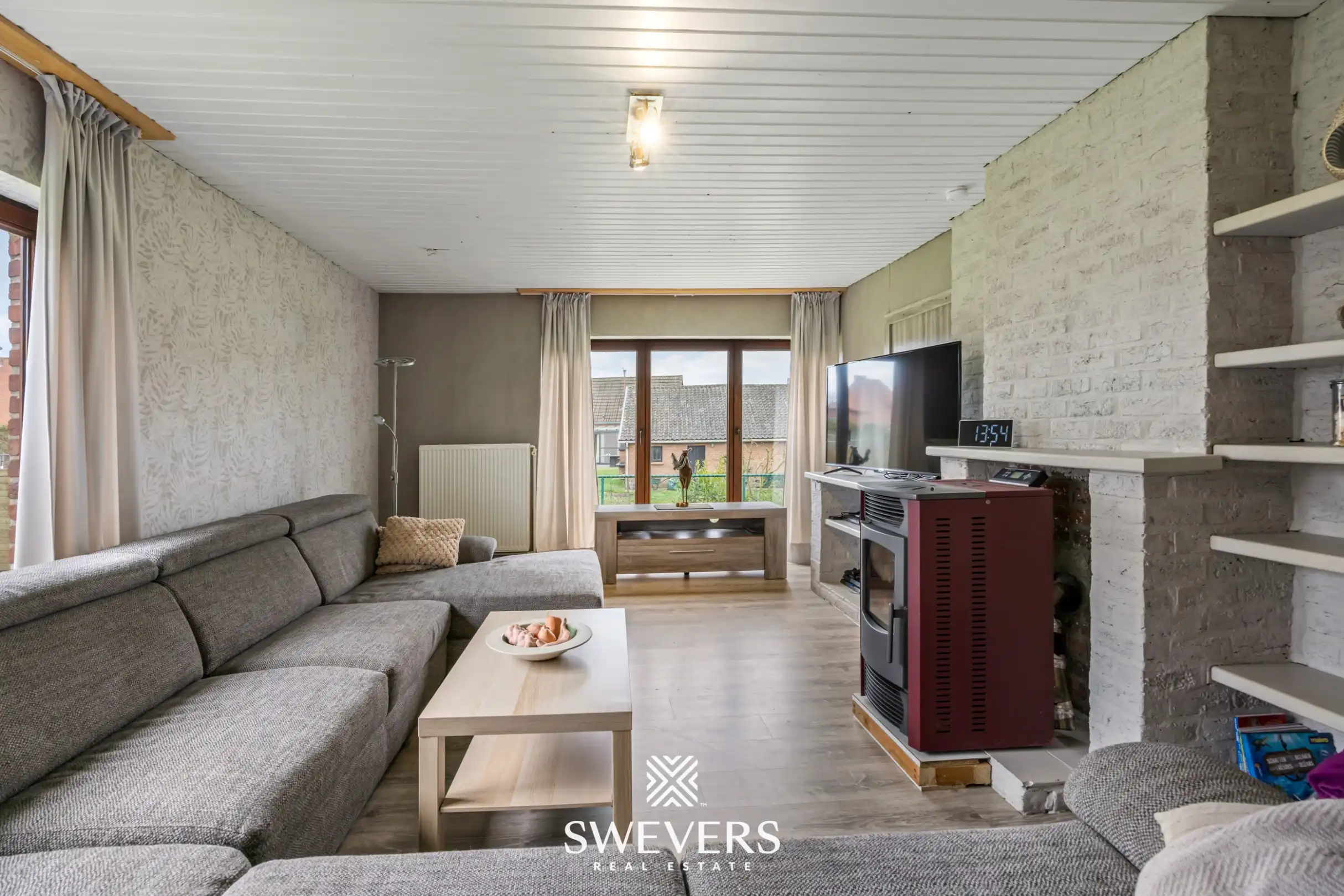 Zonnige woning met ruime zuid georiënteerde tuin in het rustige Diepenbeek foto 5