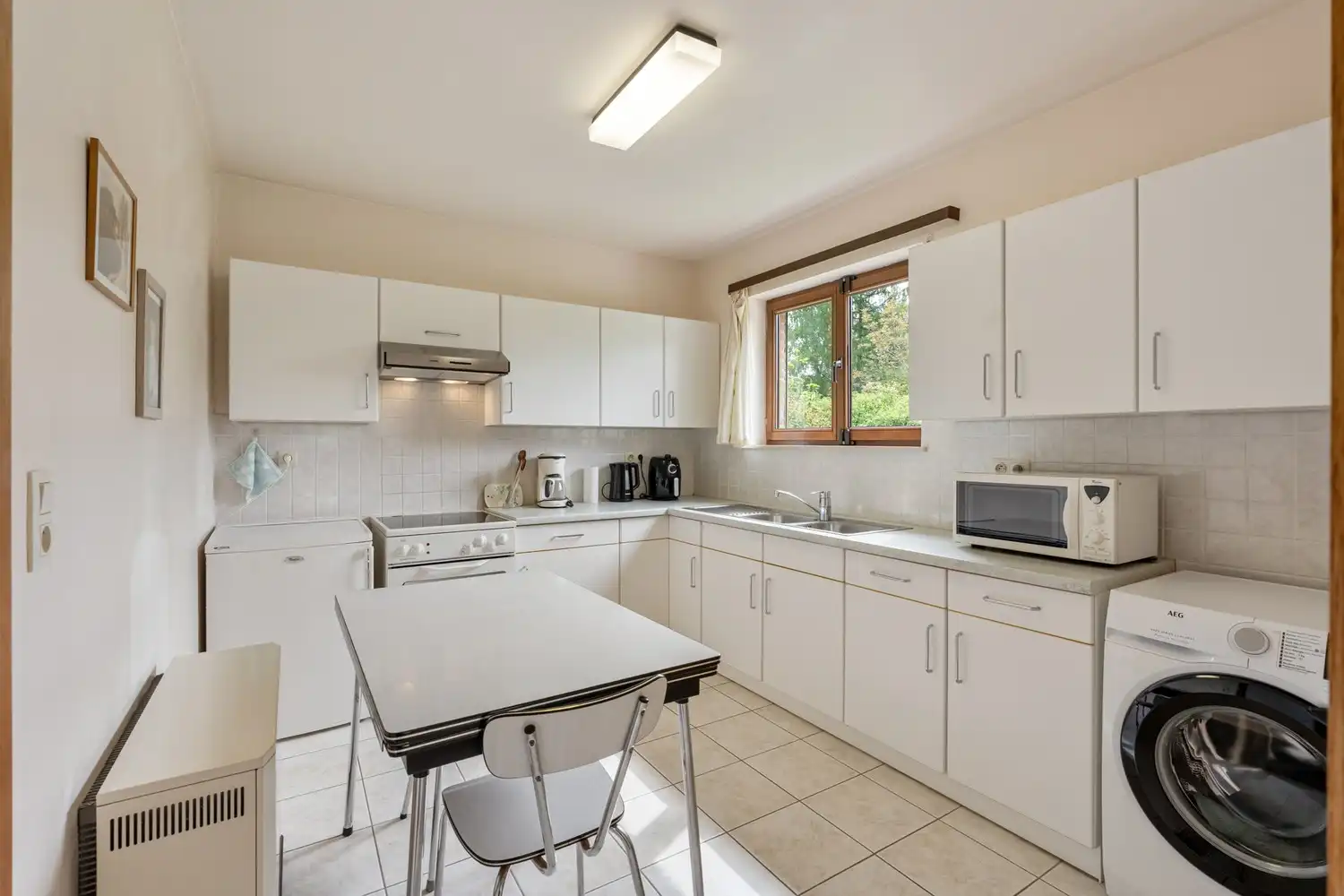 Goed en rustig gelegen woning met 2 slaapkamers, een garage en een tuin te Kessel-Lo! foto 7