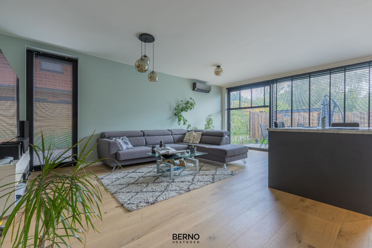 Recent gelijkvloers appartement met zonnig terras en tuintje in Opstal foto 2