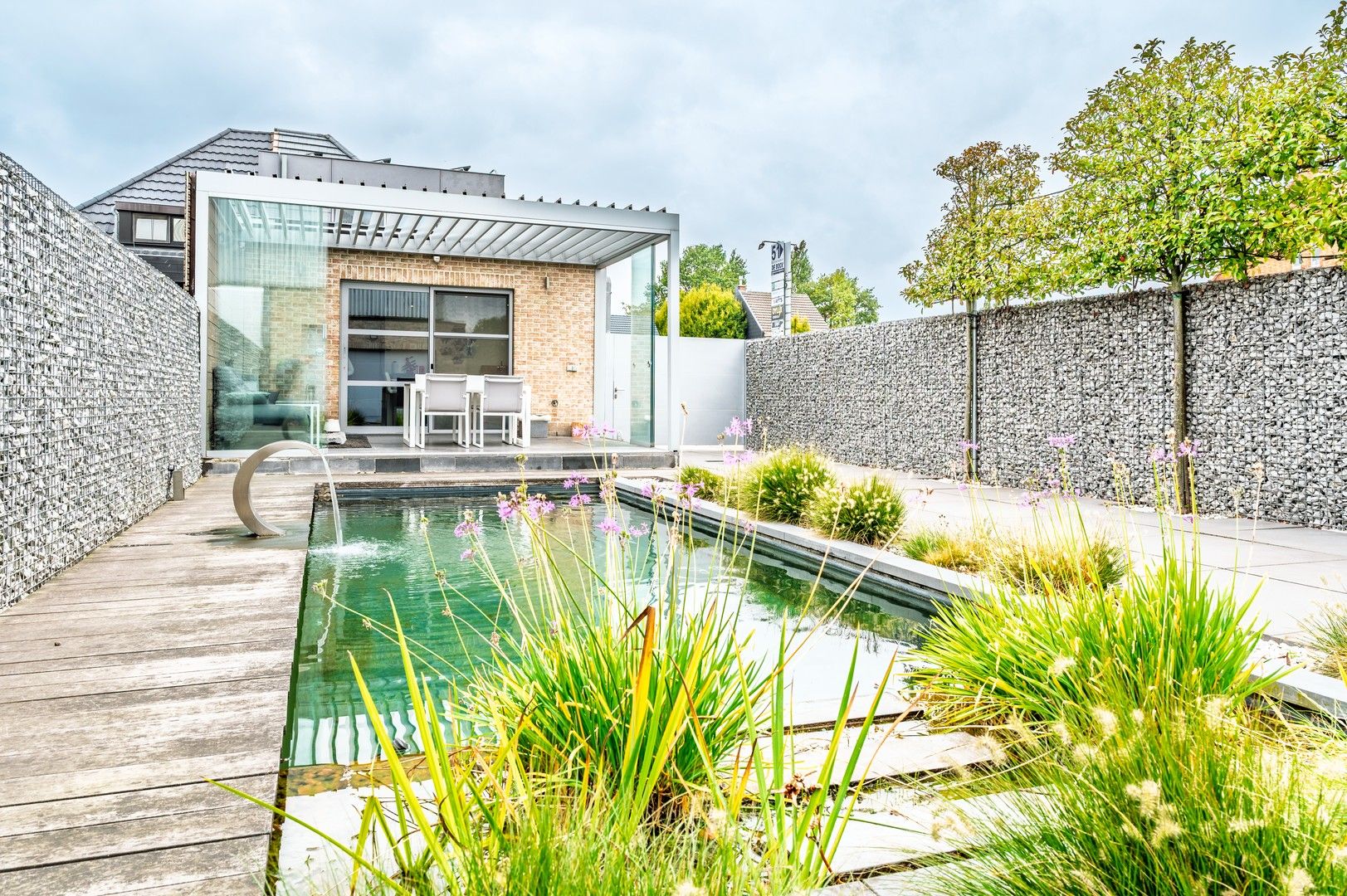 Exclusieve halfopen bebouwing met zwemvijver aan de polders van Verrebroek! foto 2