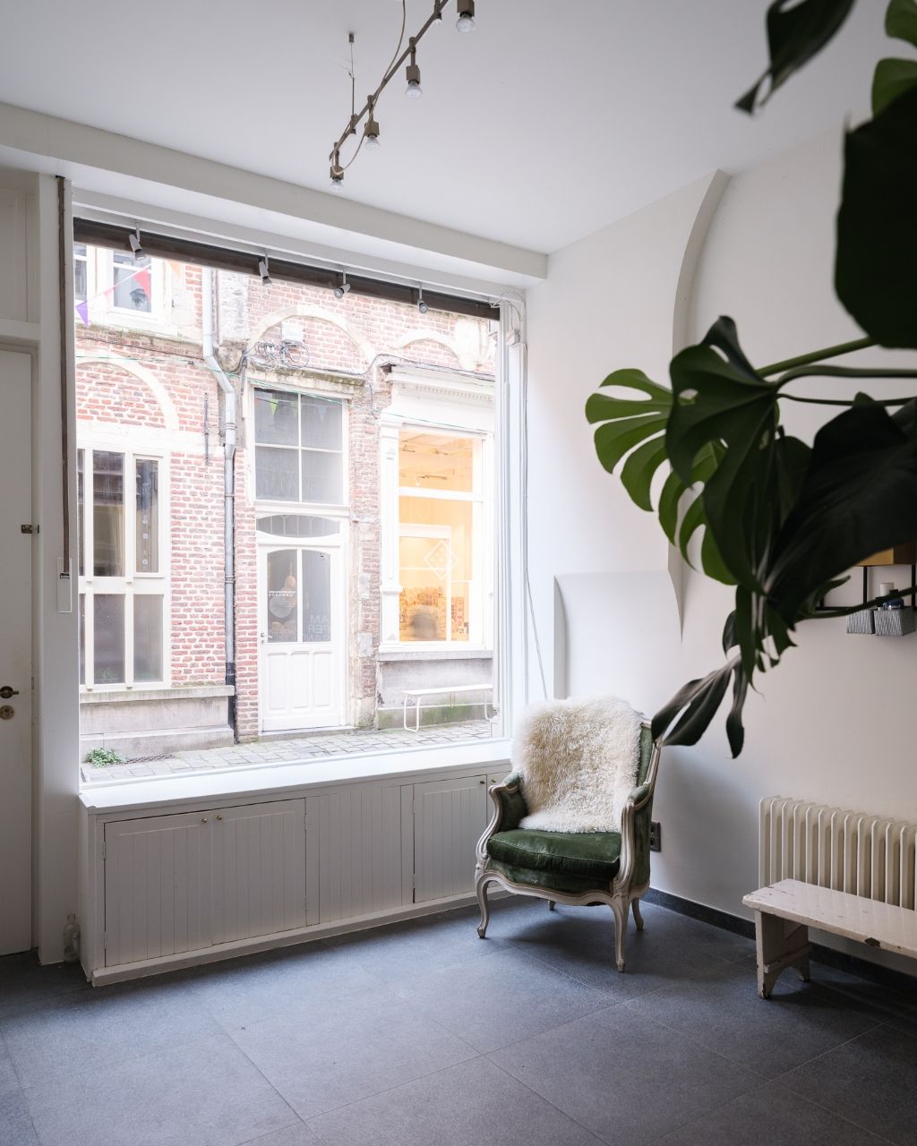 Authentieke stadswoning met twee à drie slaapkamers op 50 m van de Vrijdagmarkt. foto 3