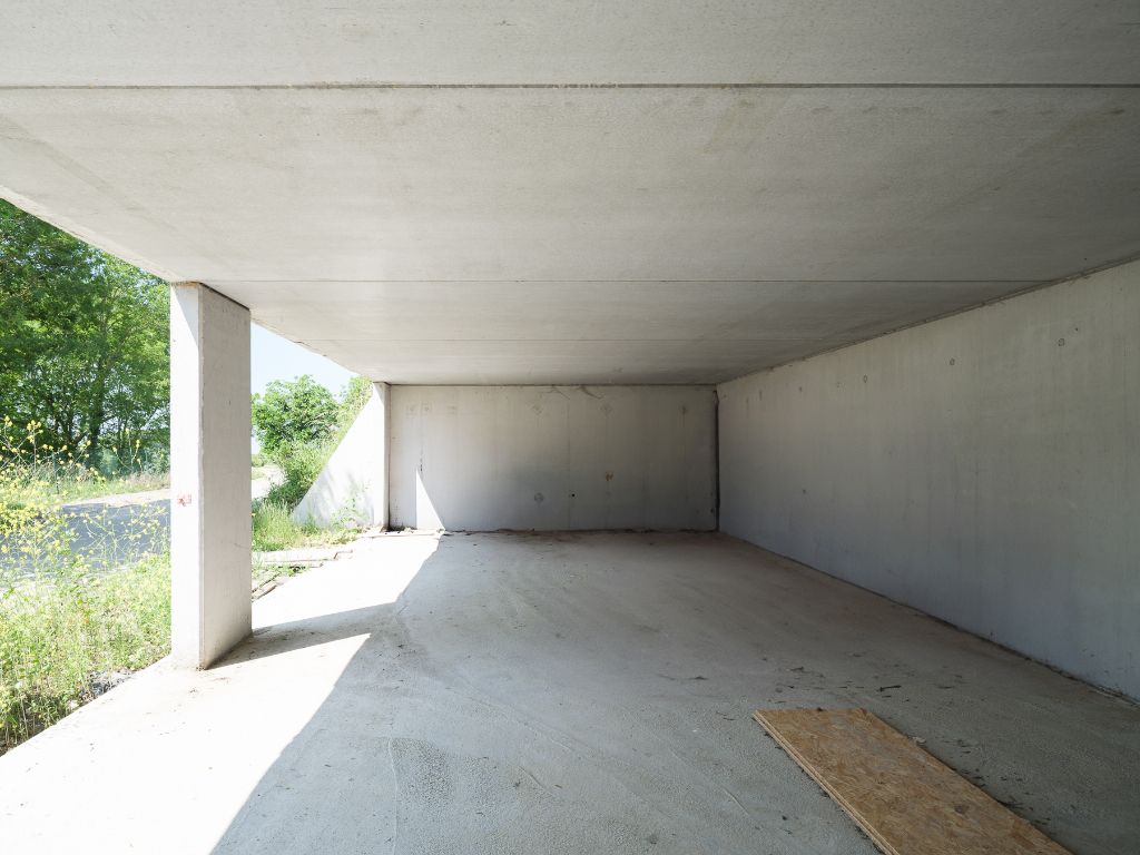 Architecturale casco-nieuwbouw bestaande uit een uitzonderlijke stapelwoning met onderliggende garage en adembenemende zichten over de Scheldevallei. foto 26