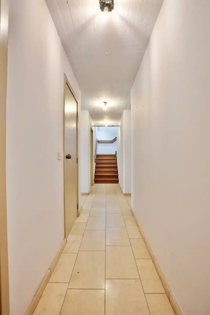 Ruime woning in een doodlopende straat met 4 slaapkamers, 2 badkamers op een prachtig perceel vlak bij het Meerdaalwoud  foto 24