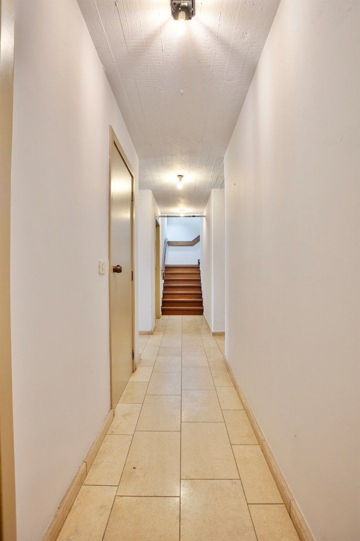 Ruime woning in een doodlopende straat met 4 slaapkamers, 2 badkamers op een prachtig perceel vlak bij het Meerdaalwoud  foto 24