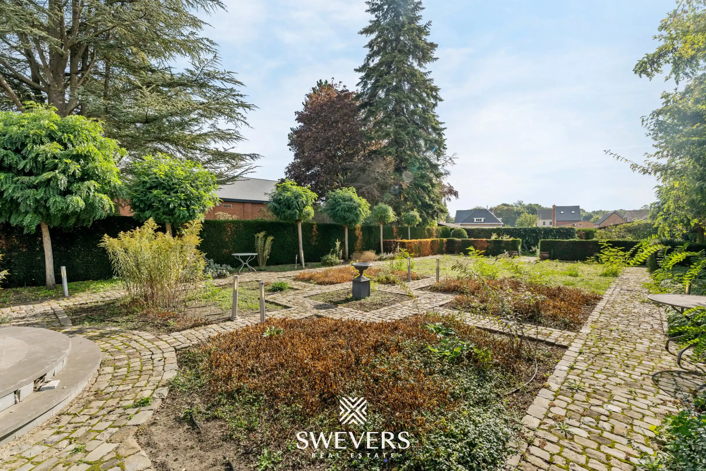 Knappe woning met orangerie, mogelijkheid tot 4 slpk en achterliggende bouwgrond foto 29
