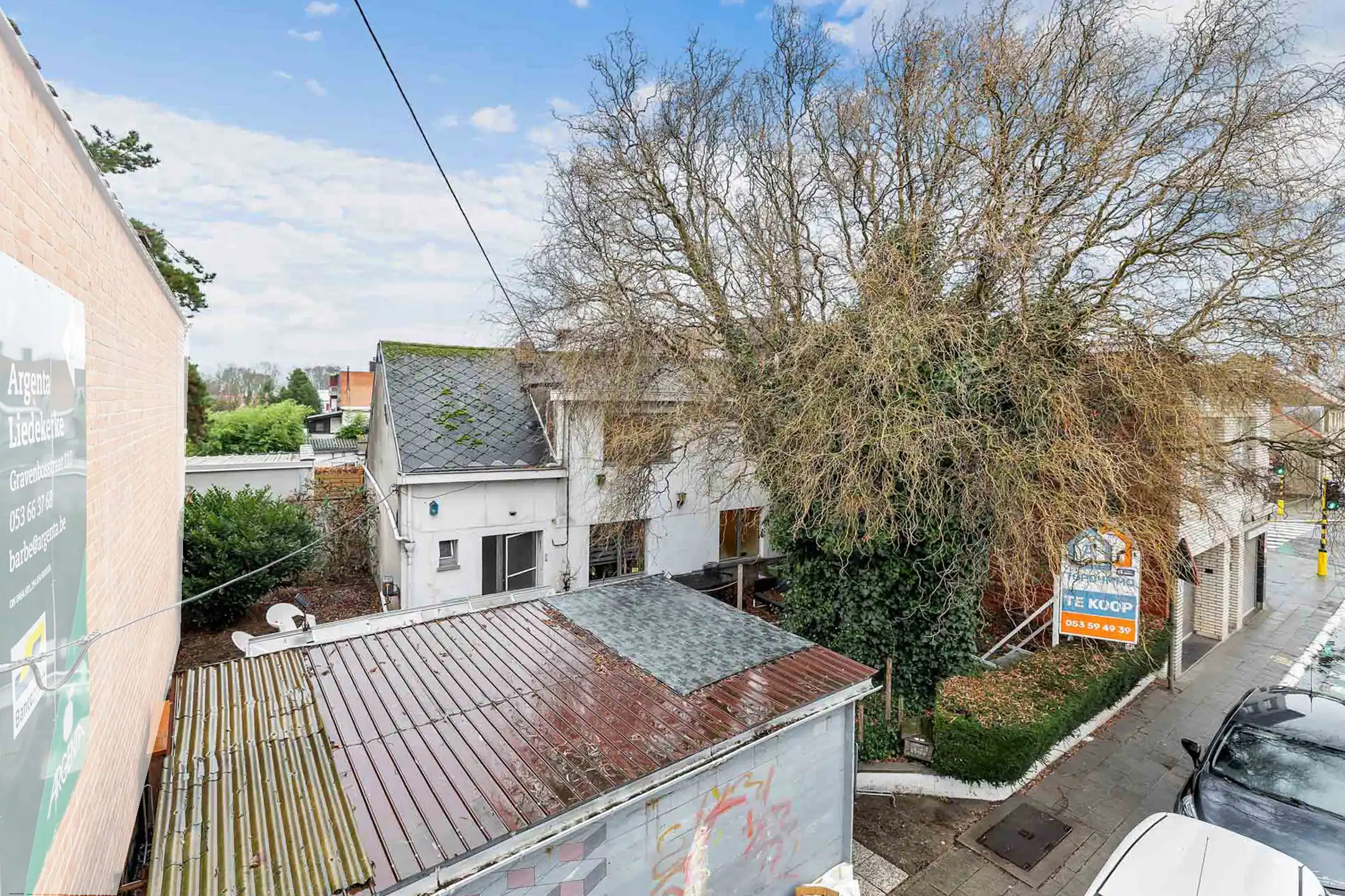 Hoofdfoto van de publicatie: Te renoveren woning met tuin op commerciële ligging