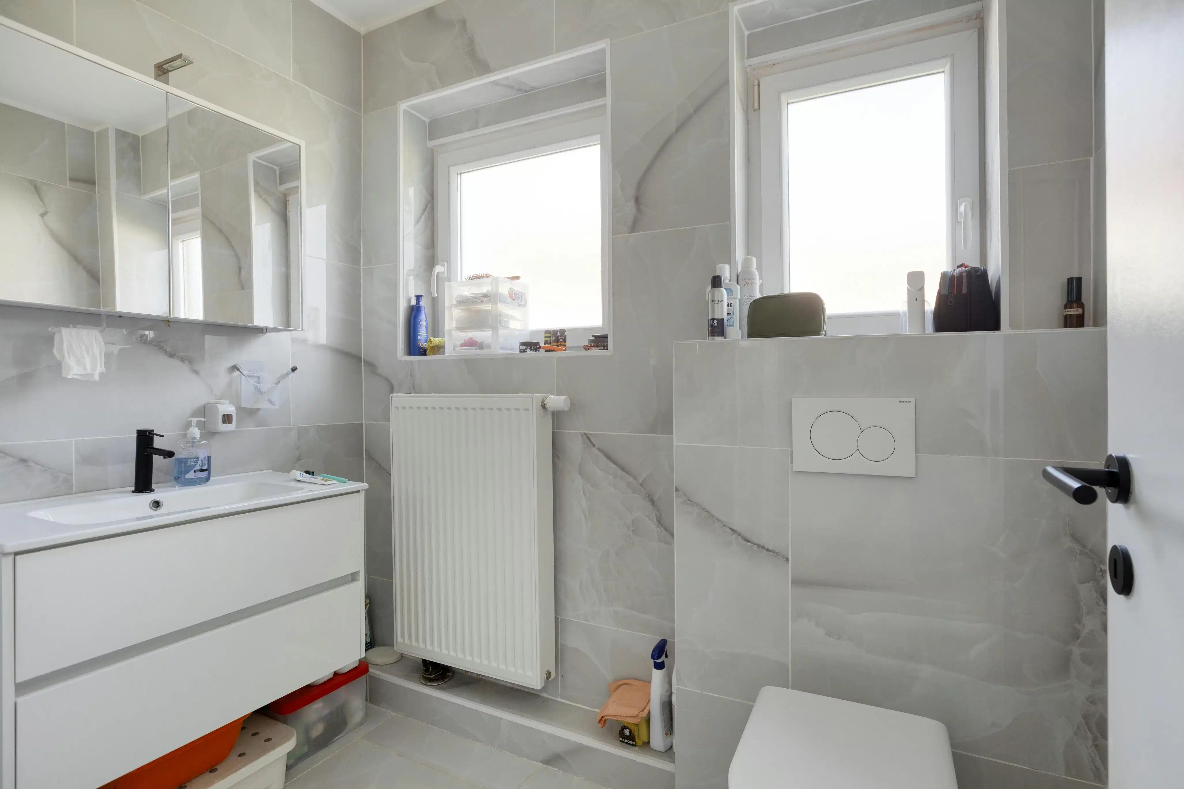 Gerenoveerd hoekappartement met 3 slaapkamers en garage foto 7