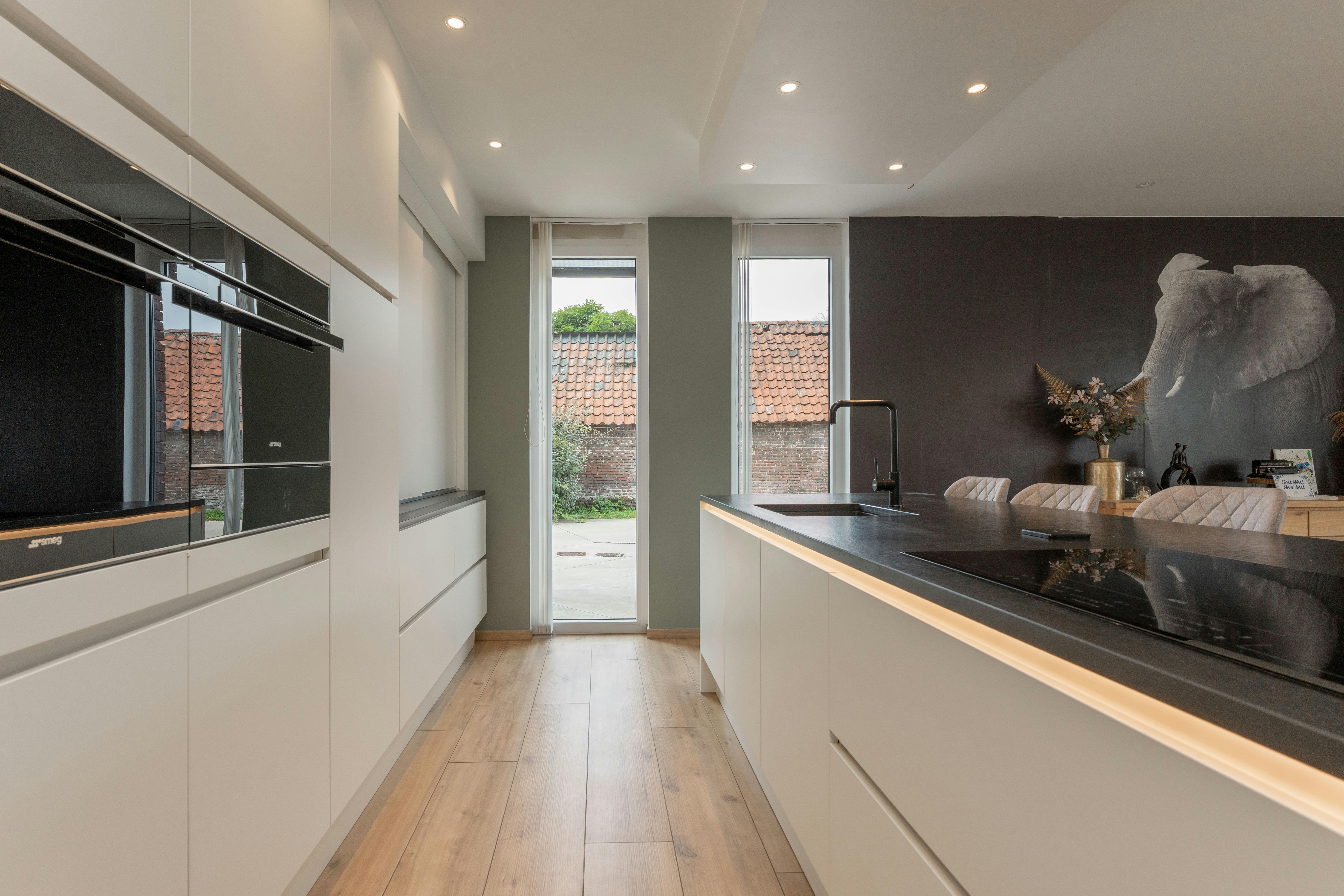 Moderne villa met zwembad en atelier te koop in Evergem foto 7