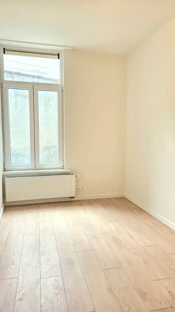 Appartement op het gelijkvloers met koer foto 10