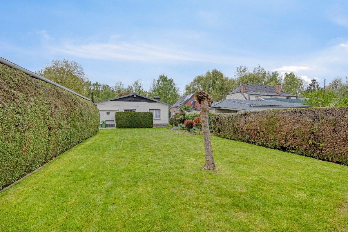 Ruime gelijkvloerse woning met zeer grote garage en leuke tuin te Tongeren  foto 23