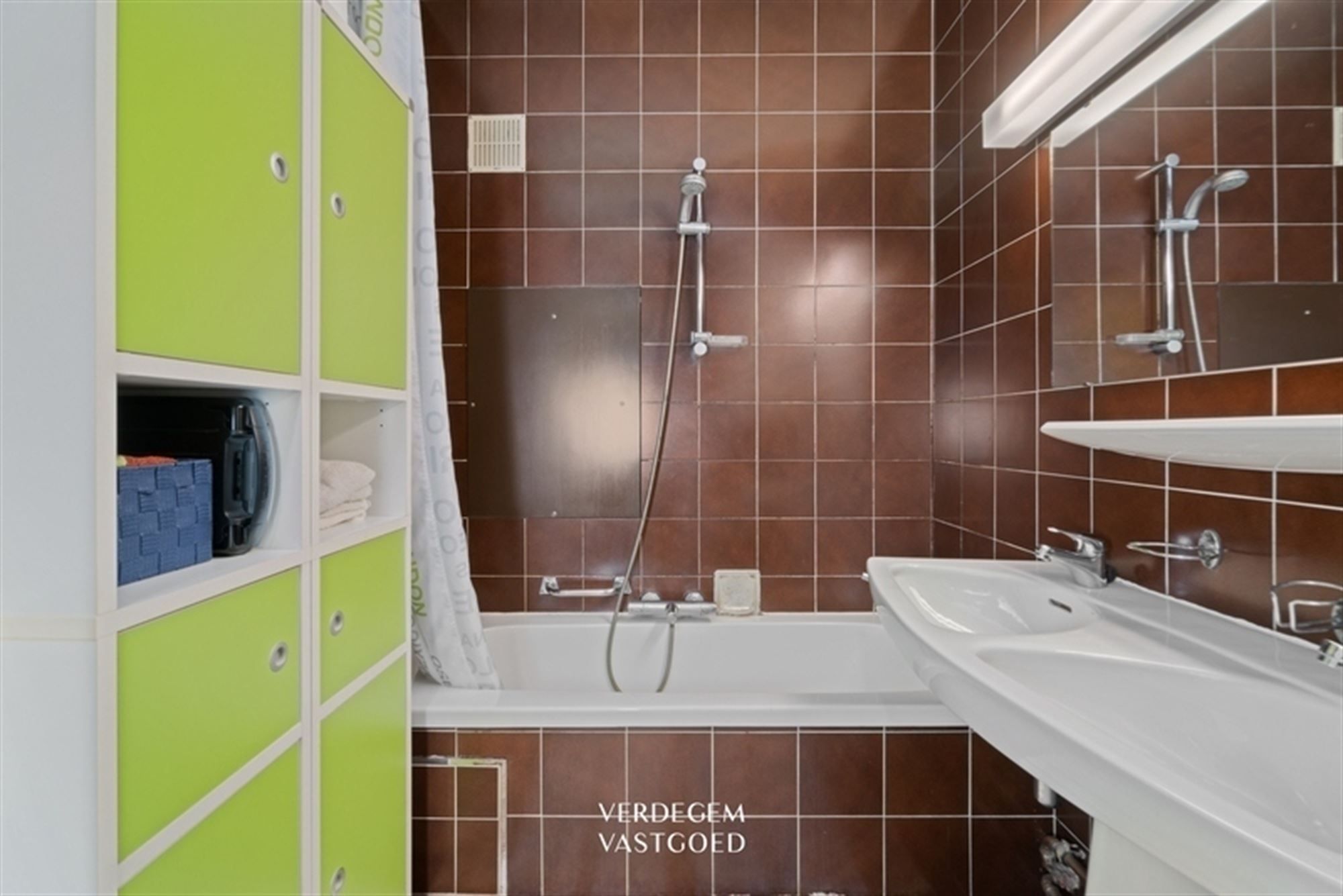 Gelijkvloers appartement met 2 slaapkamers, garage en privatieve tuin foto 12