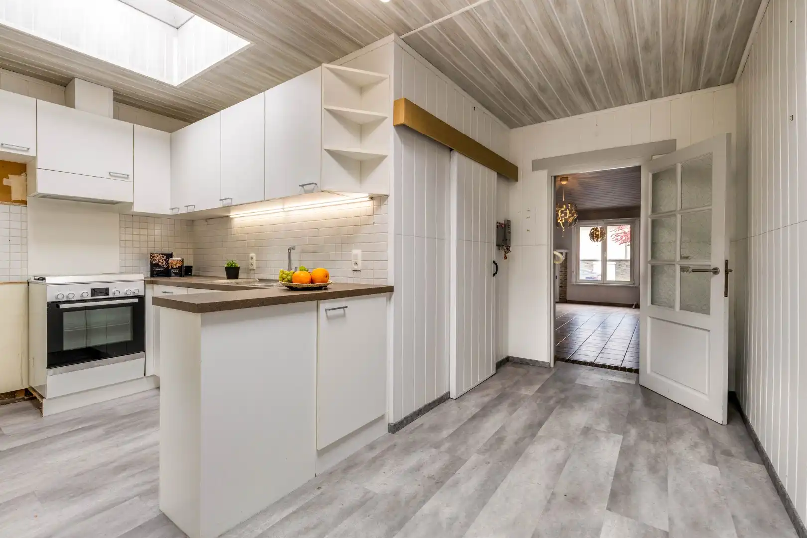 Gezellige rijwoning met grote garage, westgerichte tuin en unieke ligging in Lauwe! foto 7