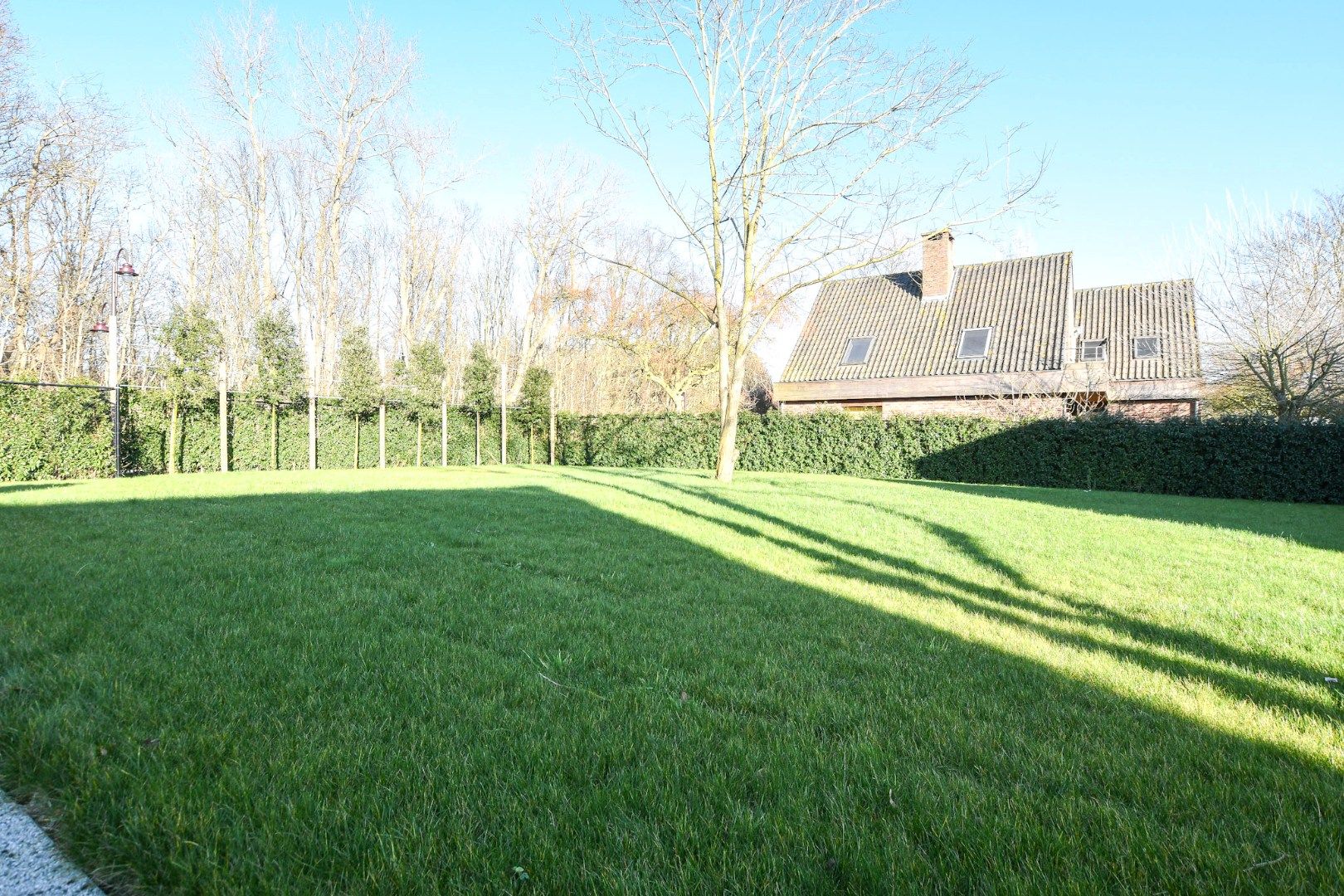 Rustig gelegen bouwgrond van 579 m² te koop in De Haan (Zuienkerke) foto {{pictureIndex}}
