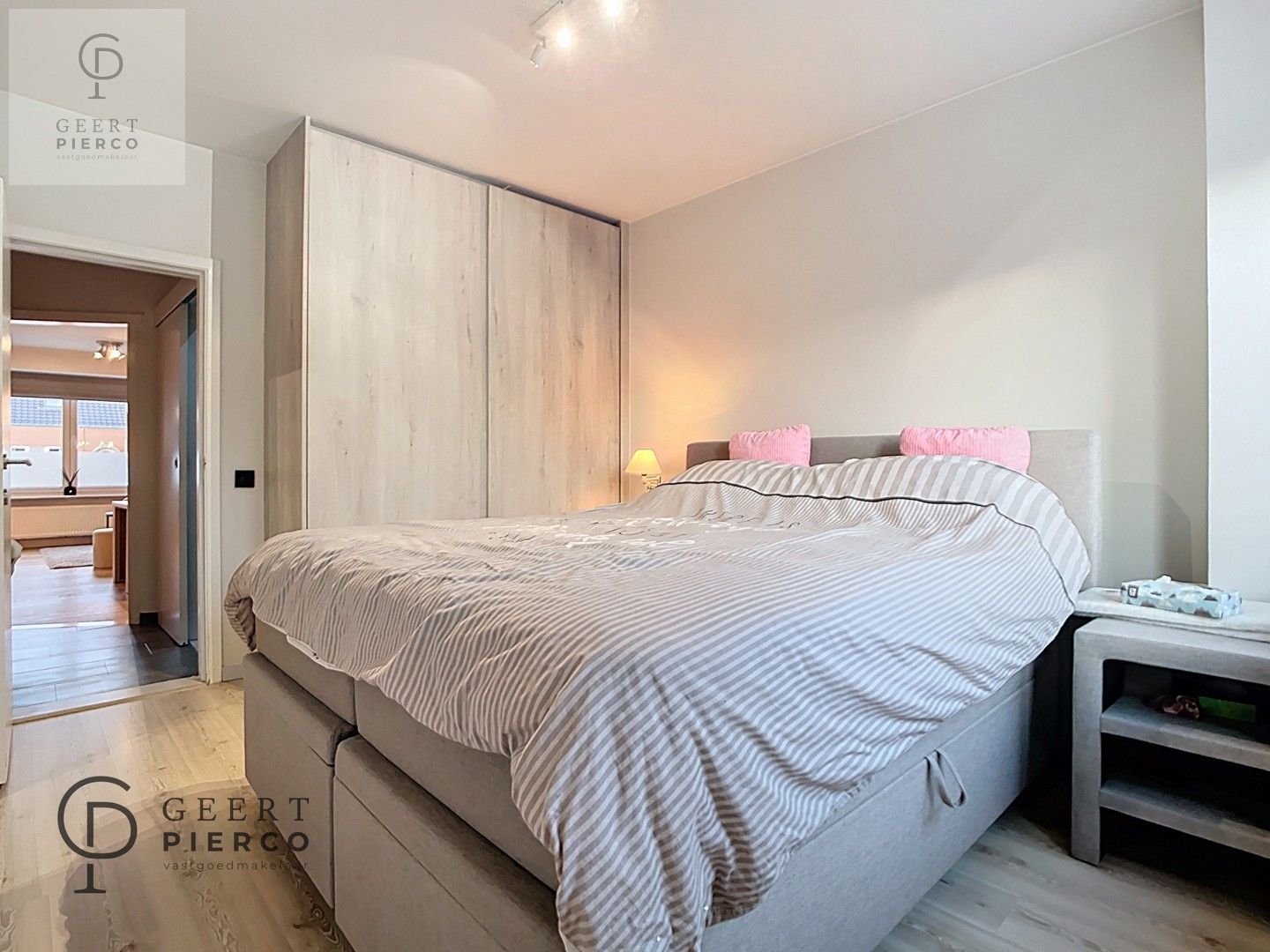 Gerenoveerd appartement met twee slaapkamers, ruim terras en ondergrondse staanplaats aan de stadsrand van Tienen. foto 14