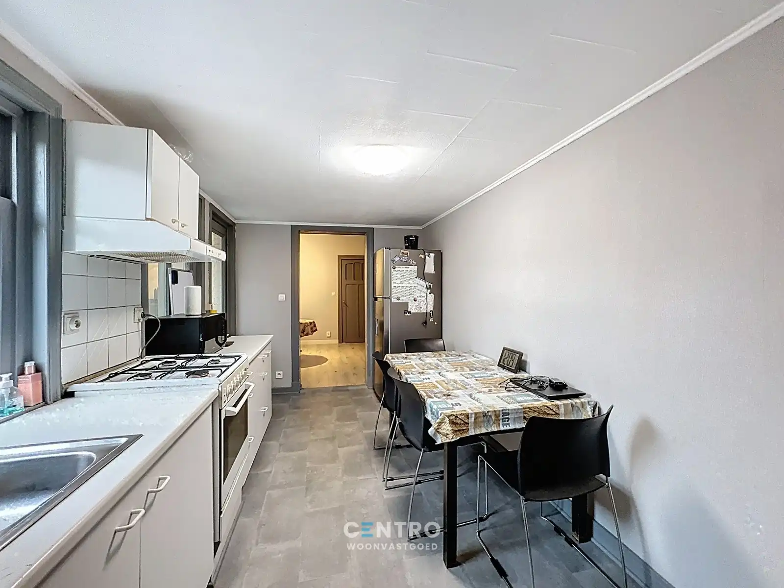 Op te frissen woning met 4 slpks én ZUIDger. tuin te Assebroek! foto 7