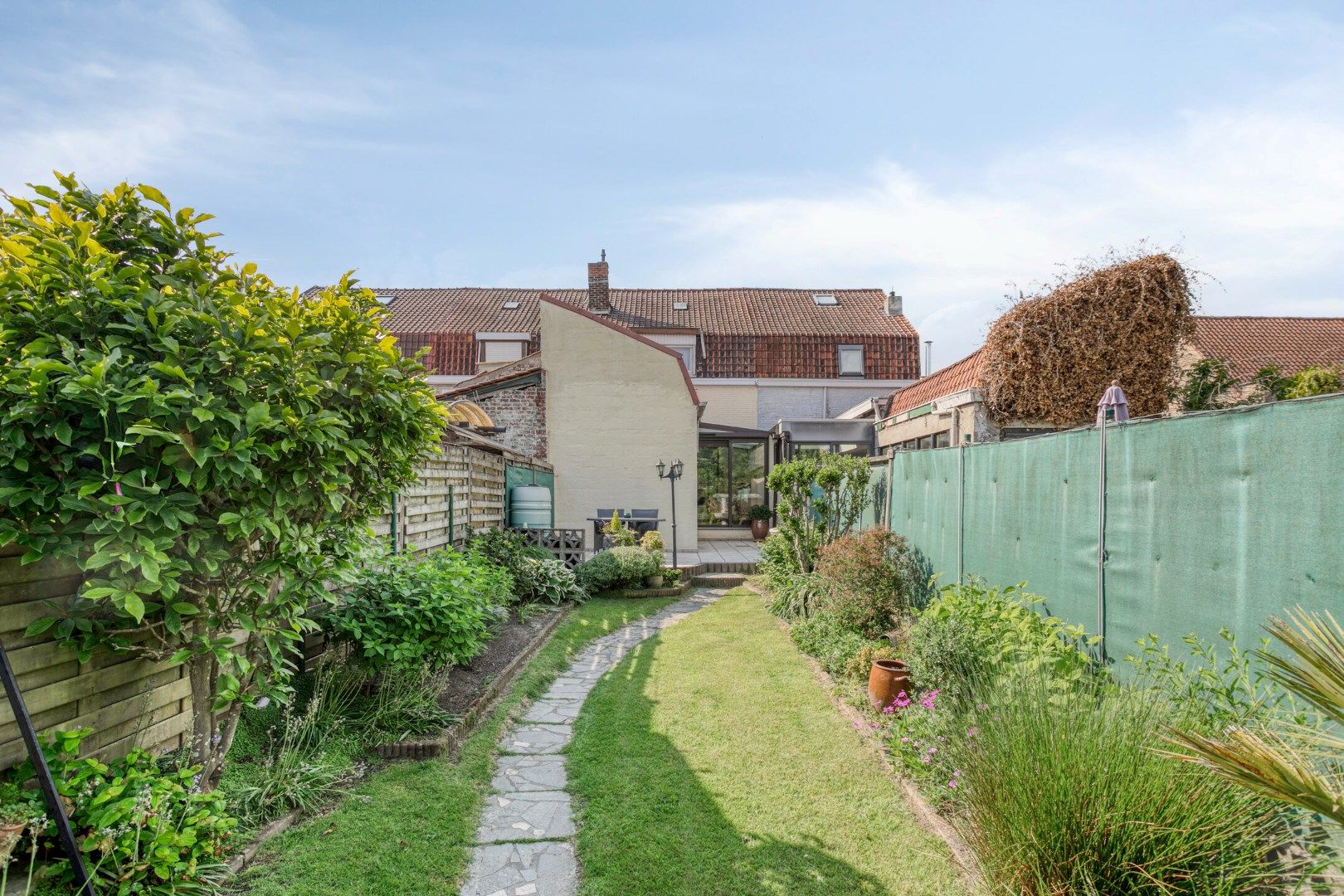 Verzorgde woning met 2 slaapkamers, prachtige tuin én garage! foto 18