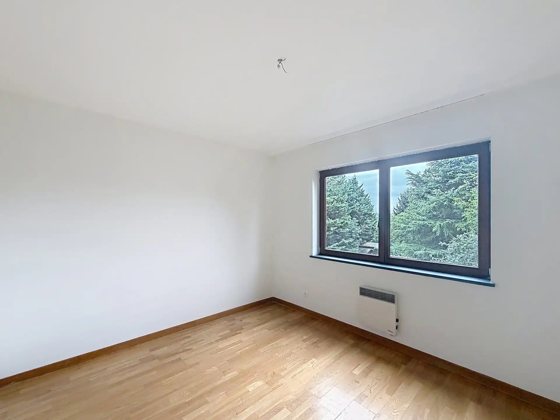 Gerenoveerd appartement met 2 slaapkamers + parkeerplaats foto 12