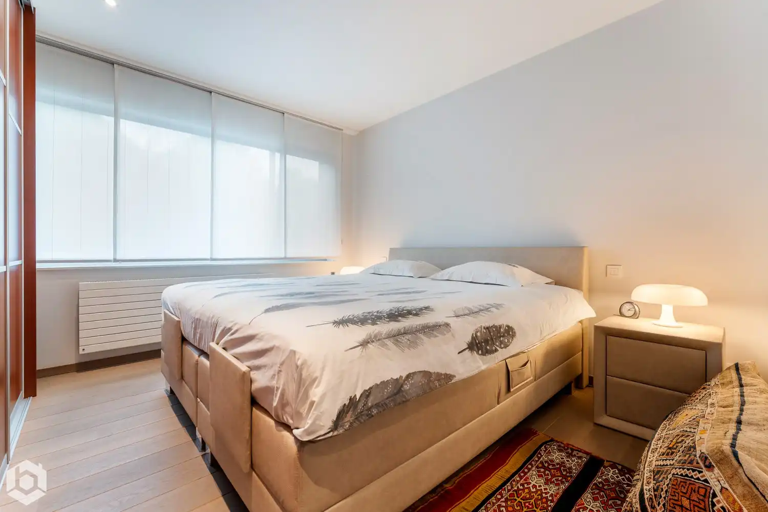 Exclusief gelijkvloers appartement met 2slpkrs, prachtige tuin en zwembad foto 16