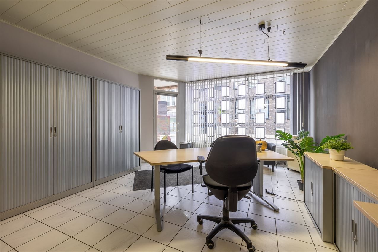 Verzorgd gebouw met handelszaak en 2 apt foto 41