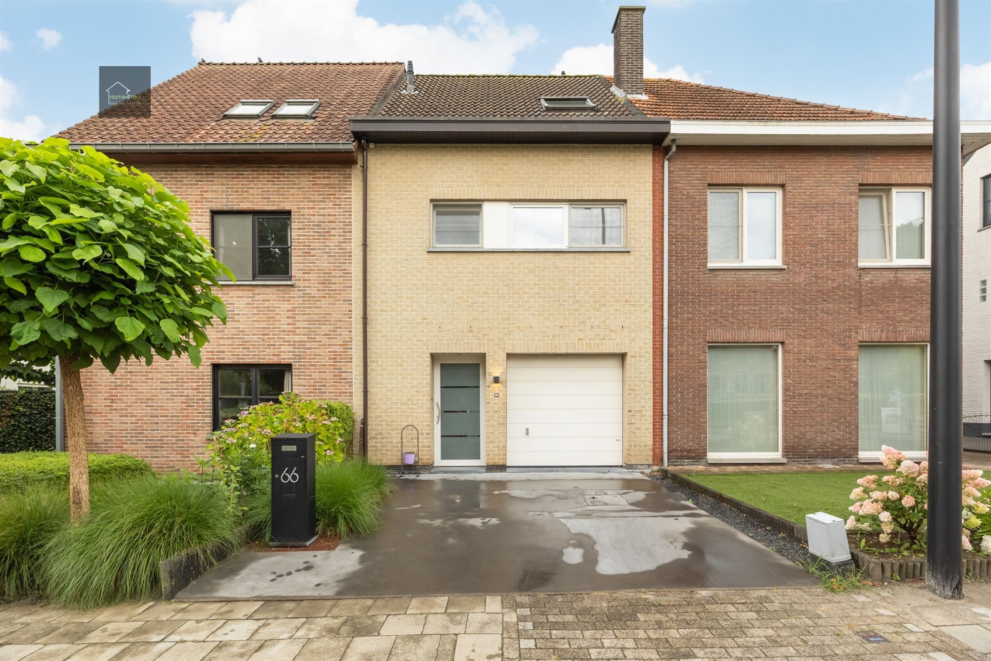 Instapklare gezinswoning met 4 slaapkamers en zuid tuin foto 2