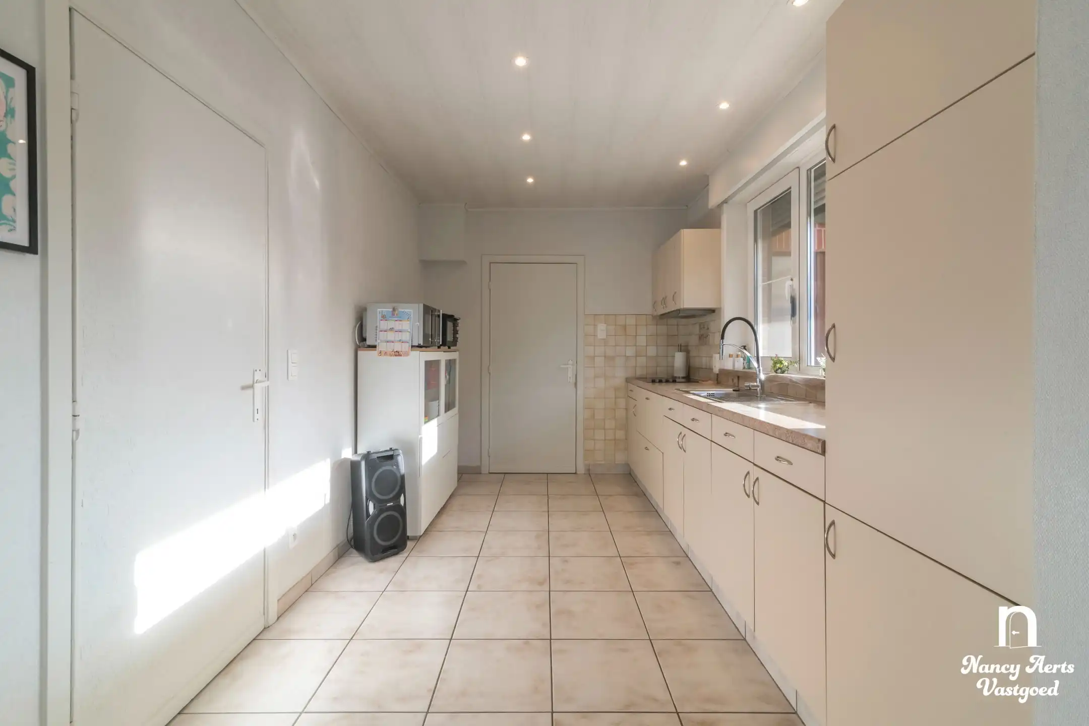 Gerenoveerde instapklare woning met zuidgerichte tuin foto 28