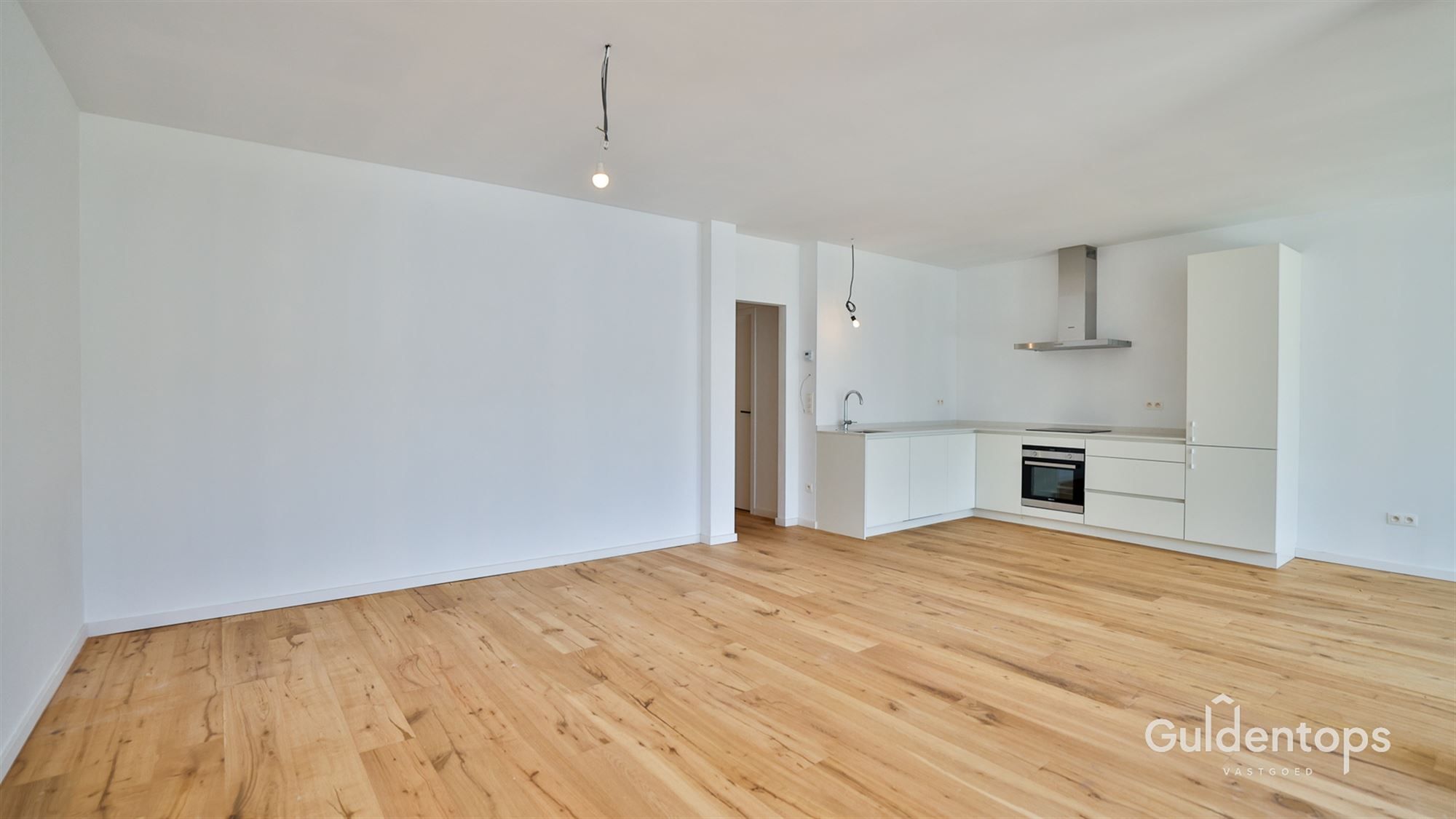 Knap gelijkvloers appartement in hartje Lier met grote tuin foto 14